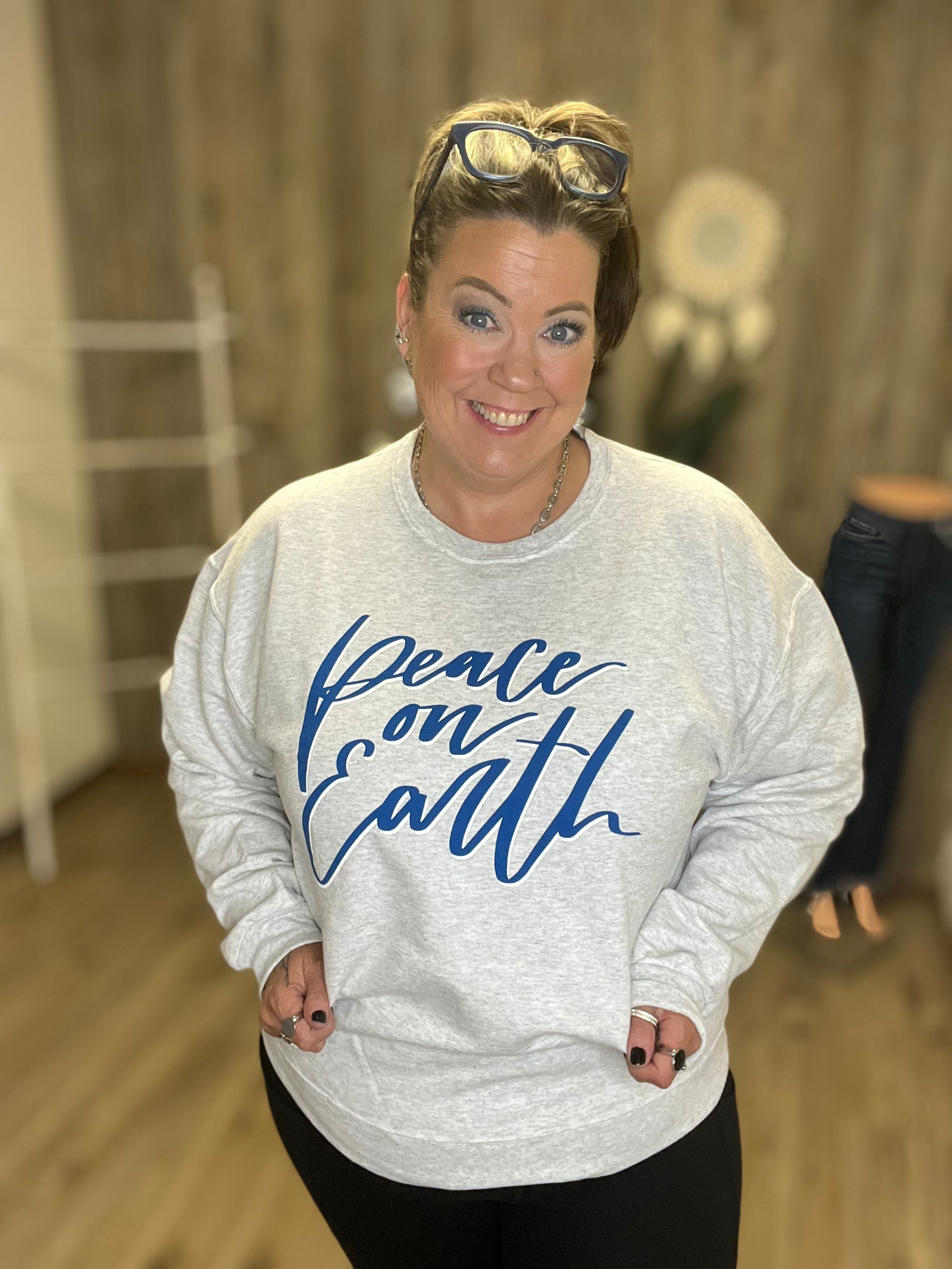 PEACE ON EARTH SWEATSHIRT